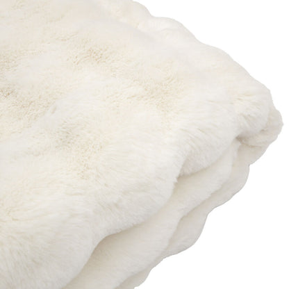 marshmallow faux rabbit throw in cream