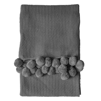 pippa pom pom throw in grey - nineteen/seventy