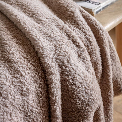 teddy fleece throw in taupe - nineteen/seventy